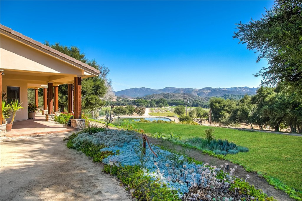 40635 De Luz Road Fallbrook, CA 92028 - Photo 18 of 75 a front view of a house with a yard