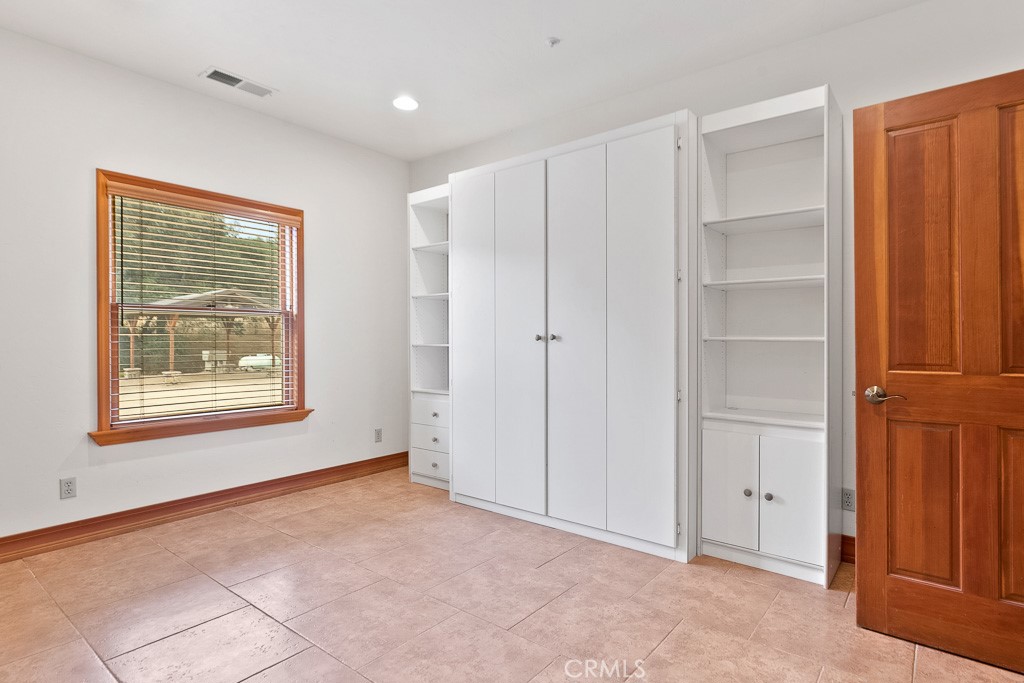 40635 De Luz Road Fallbrook, CA 92028 - Photo 32 of 75 a view of an empty room with a closet
