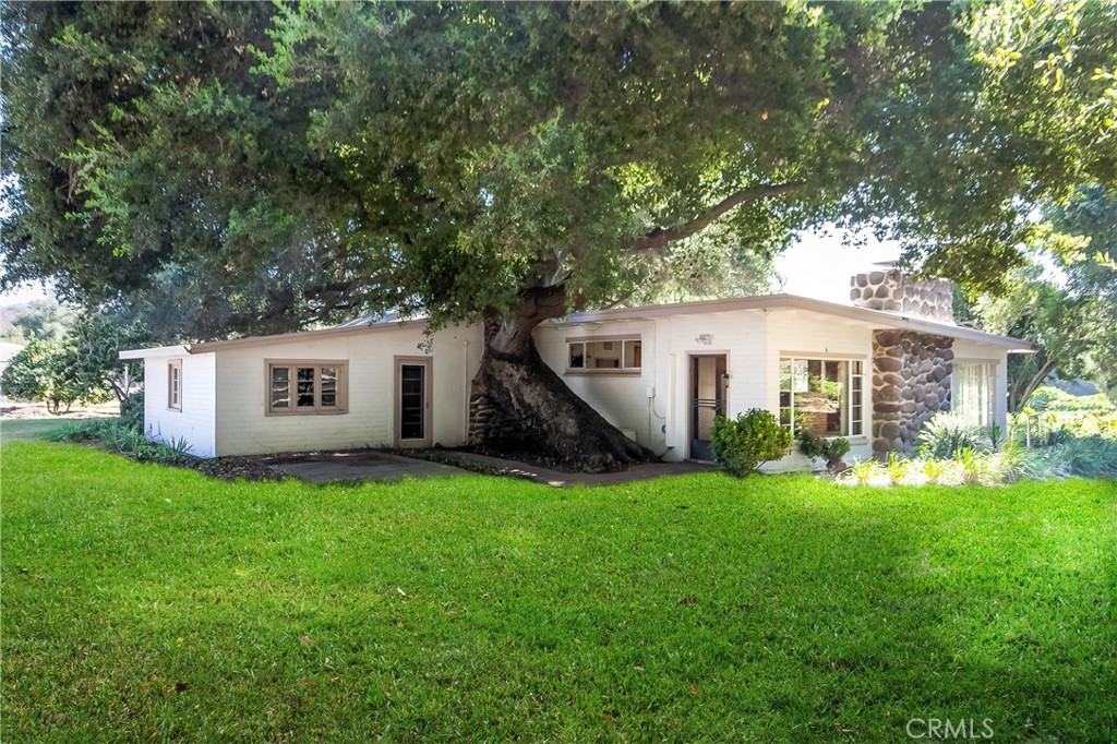 40635 De Luz Road Fallbrook, CA 92028 - Photo 40 of 75 a view of a house with a yard and deck