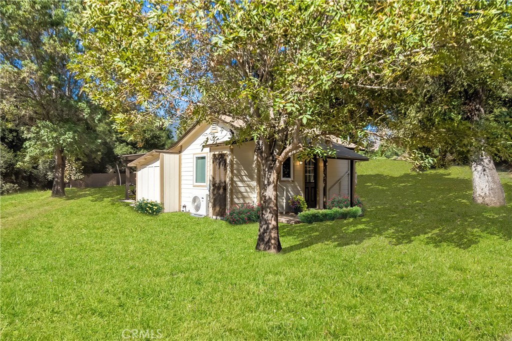 40635 De Luz Road Fallbrook, CA 92028 - Photo 56 of 75 a tree in front of a white house