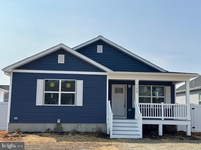 708 Jackson Street Colonial Beach, VA 22443 - Photo 2 of 2 a front view of a house