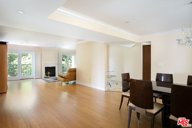 a view of a livingroom with furniture and a fireplace