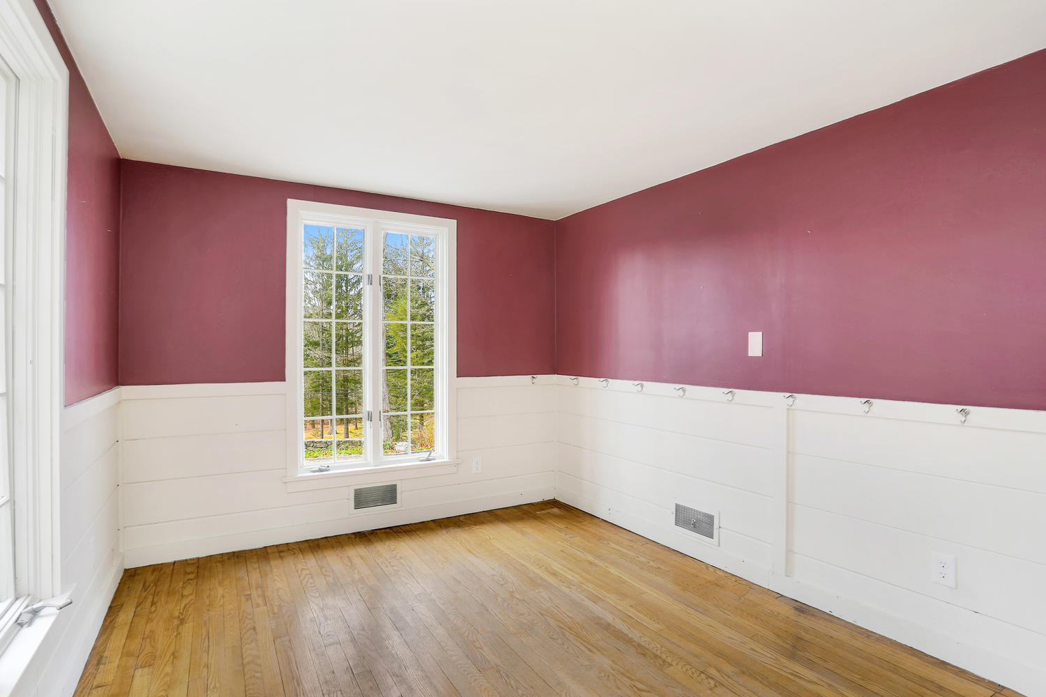 129 Hickok Road New Canaan, CT 06840 - Photo 14 of 32 a view of a livingroom with wooden floor and a window