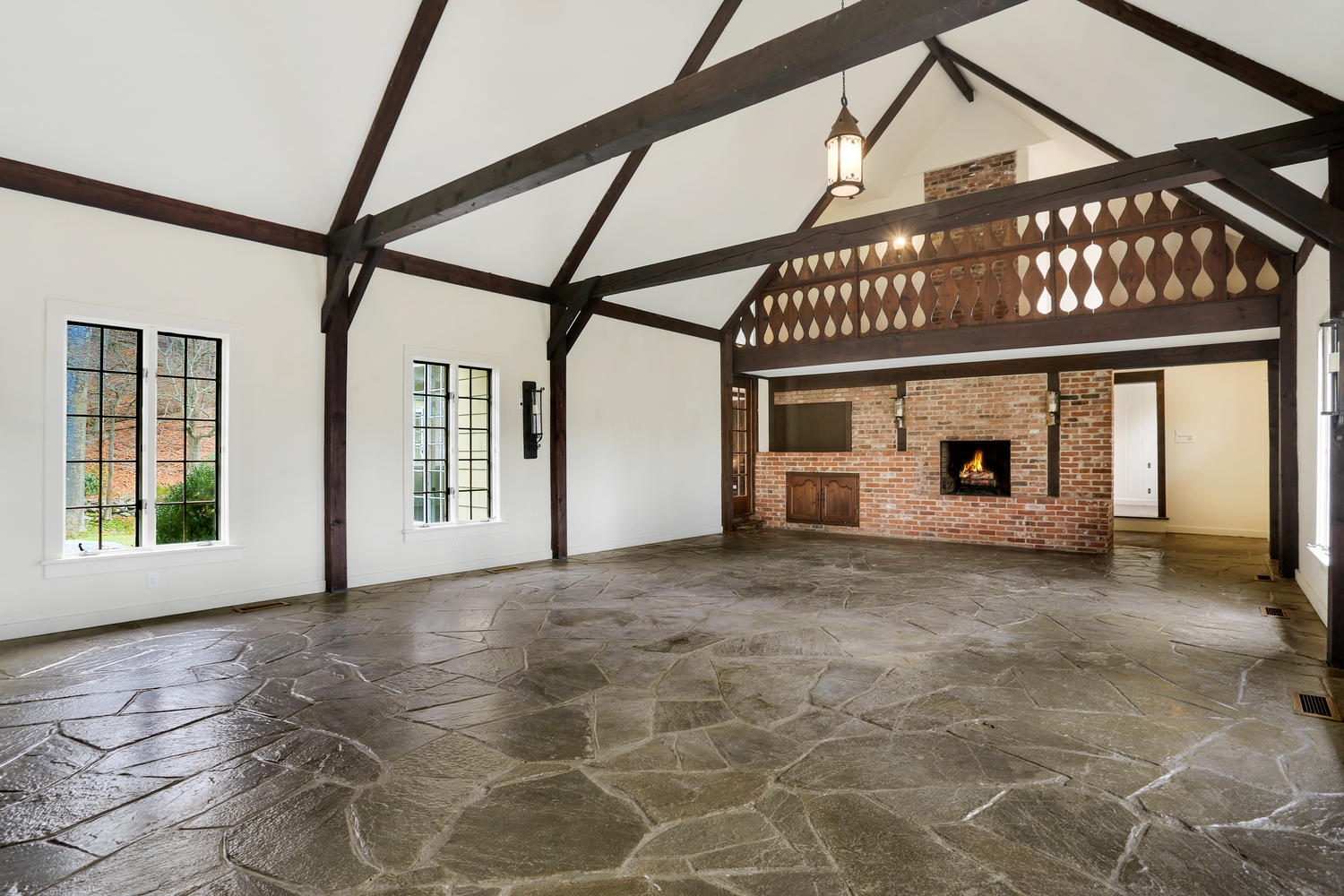129 Hickok Road New Canaan, CT 06840 - Photo 6 of 32 a big room with windows