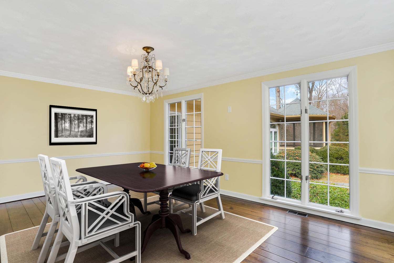 129 Hickok Road New Canaan, CT 06840 - Photo 7 of 32 a view of a dining room with furniture wooden floor and a window