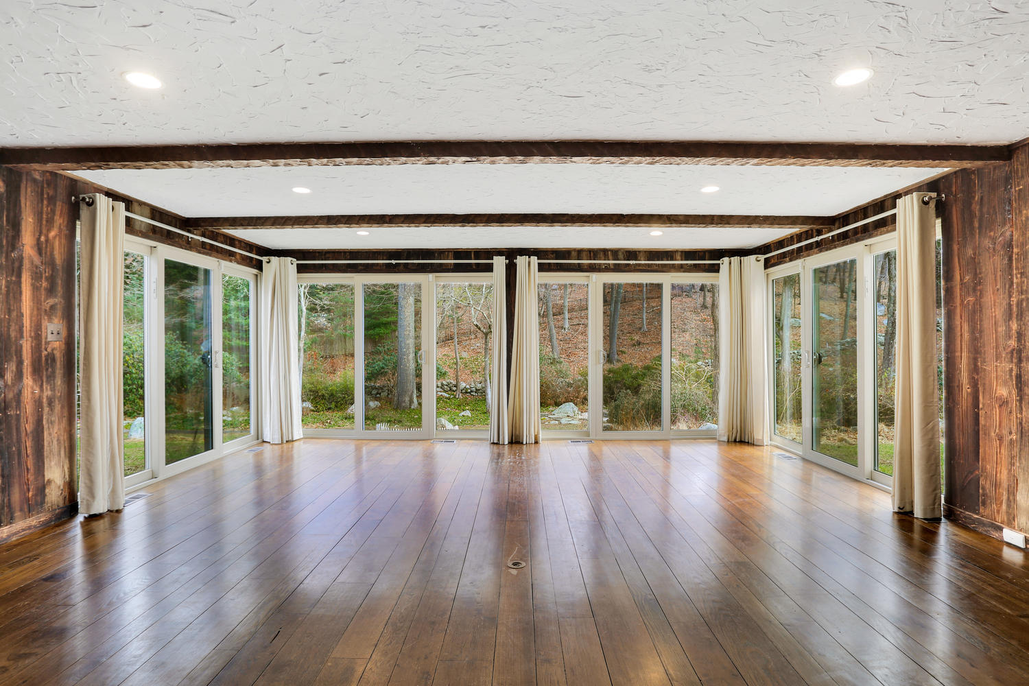 129 Hickok Road New Canaan, CT 06840 - Photo 10 of 32 a view of hallway with wooden floor