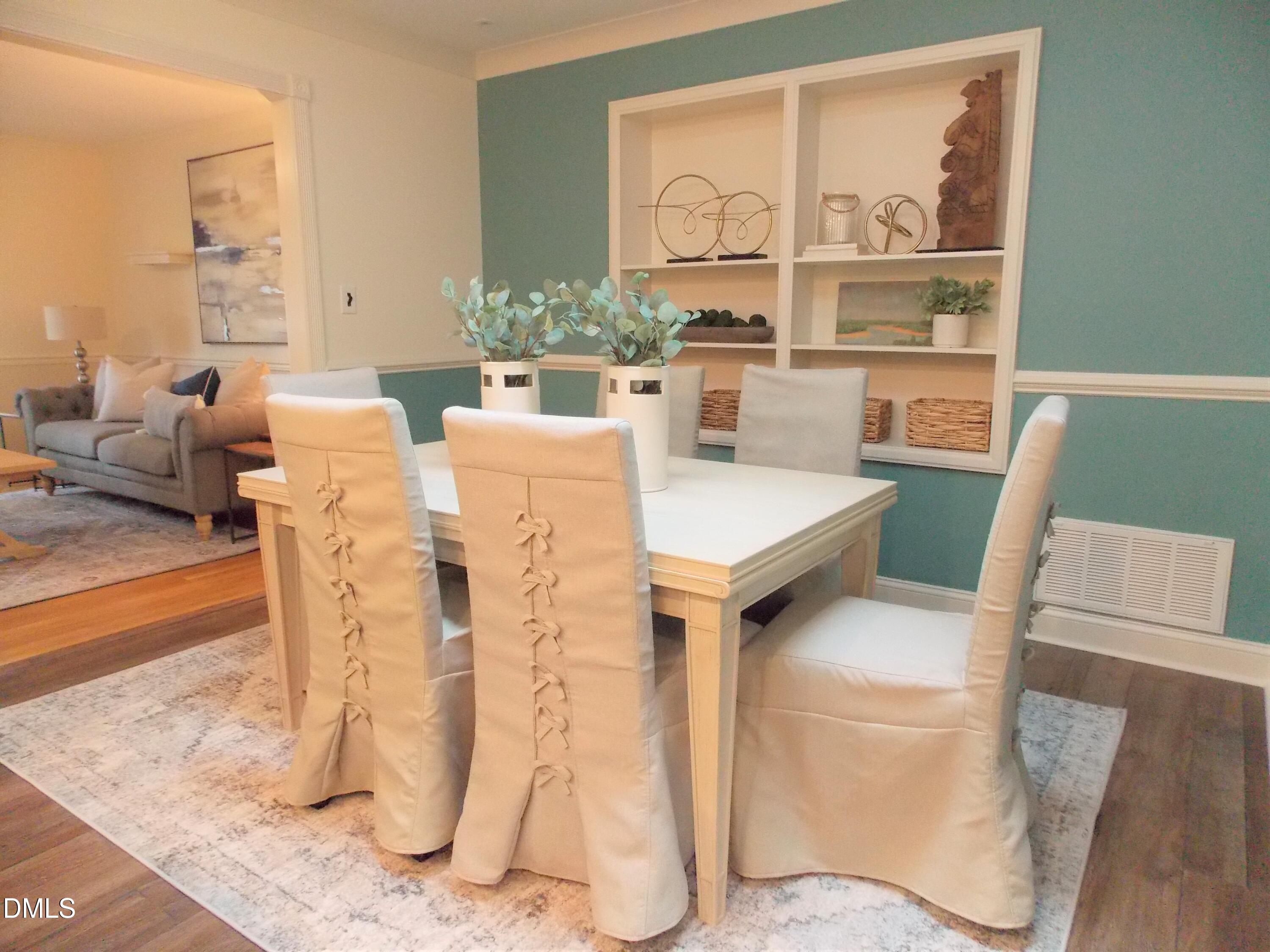 4108 Pleasant Grove Church Road Raleigh, NC 27613 - Photo 14 of 38 a living room with furniture a large window and wood floor