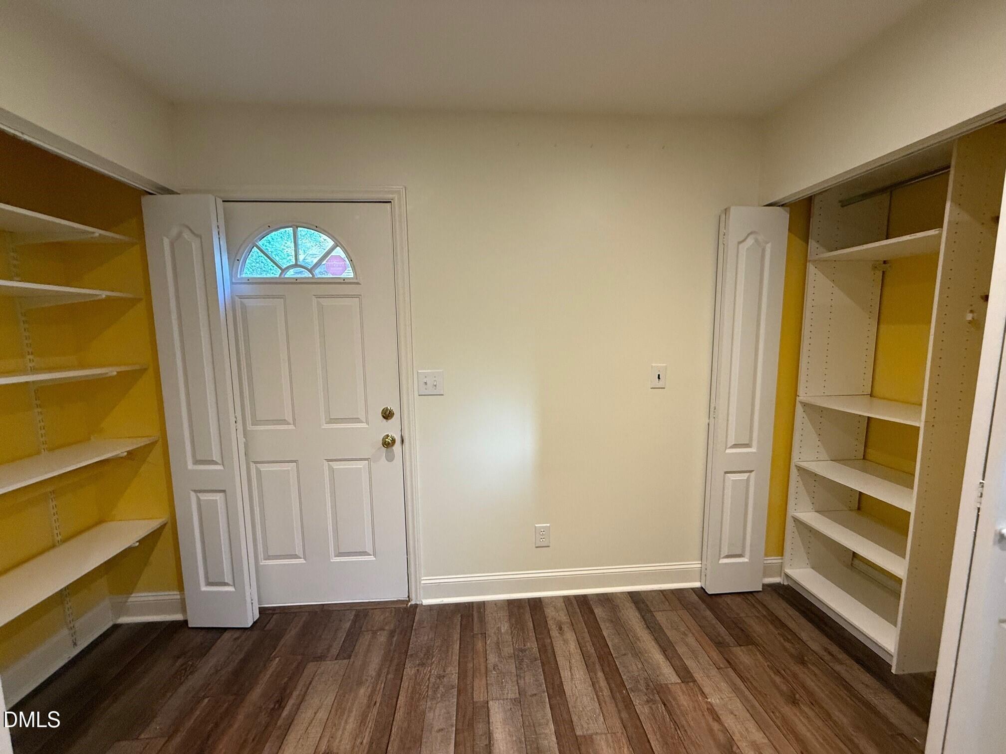 4108 Pleasant Grove Church Road Raleigh, NC 27613 - Photo 31 of 38 a view of an empty room with wooden floor and a window