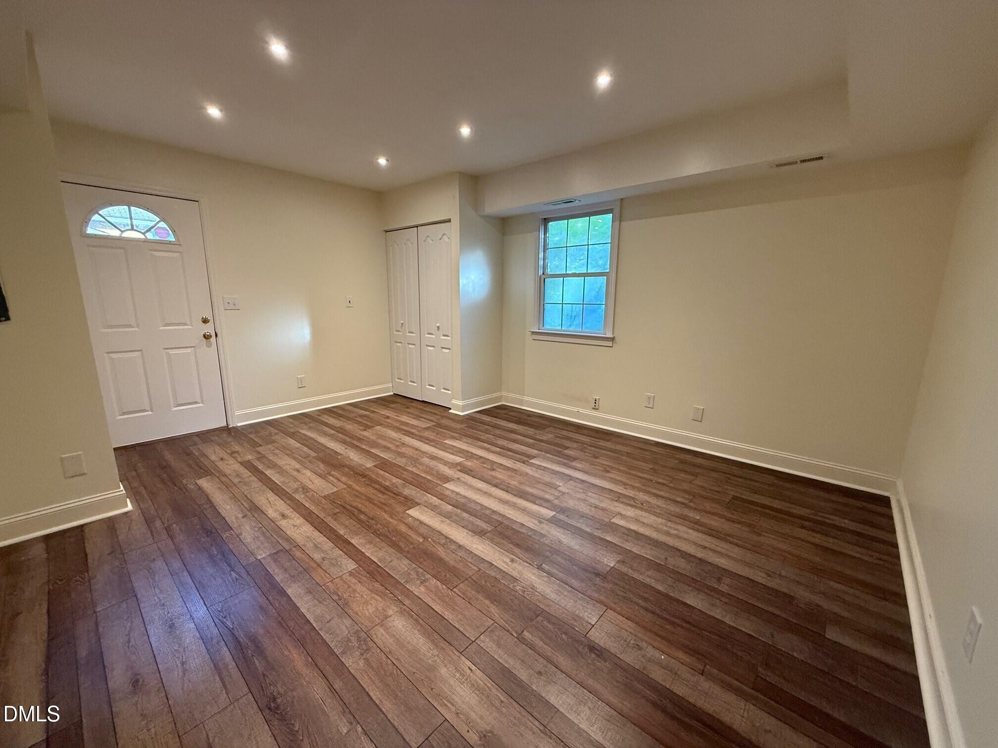 4108 Pleasant Grove Church Road Raleigh, NC 27613 - Photo 33 of 38 a view of empty room with wooden floor