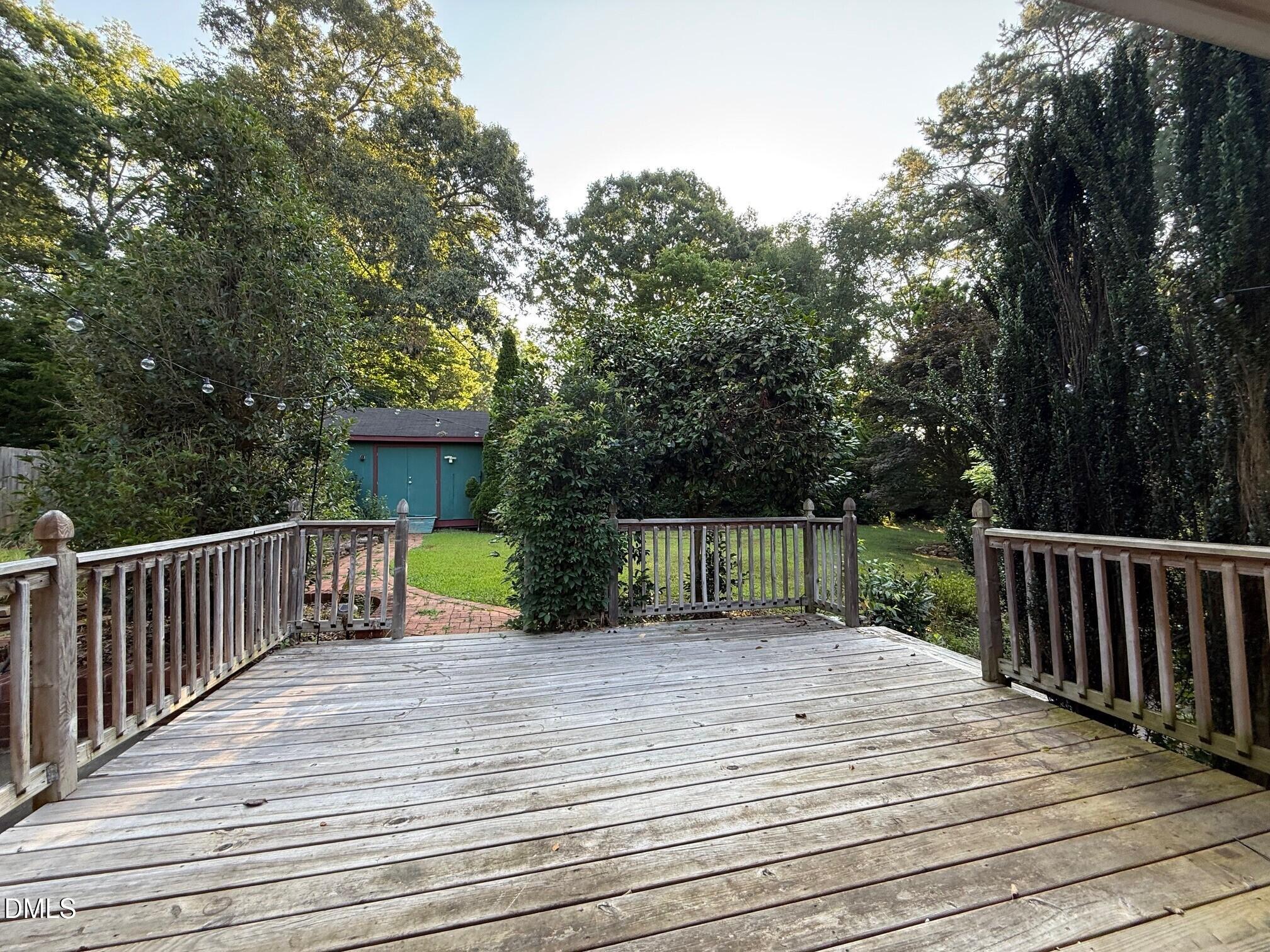 4108 Pleasant Grove Church Road Raleigh, NC 27613 - Photo 38 of 38 a view of house with backyard and deck