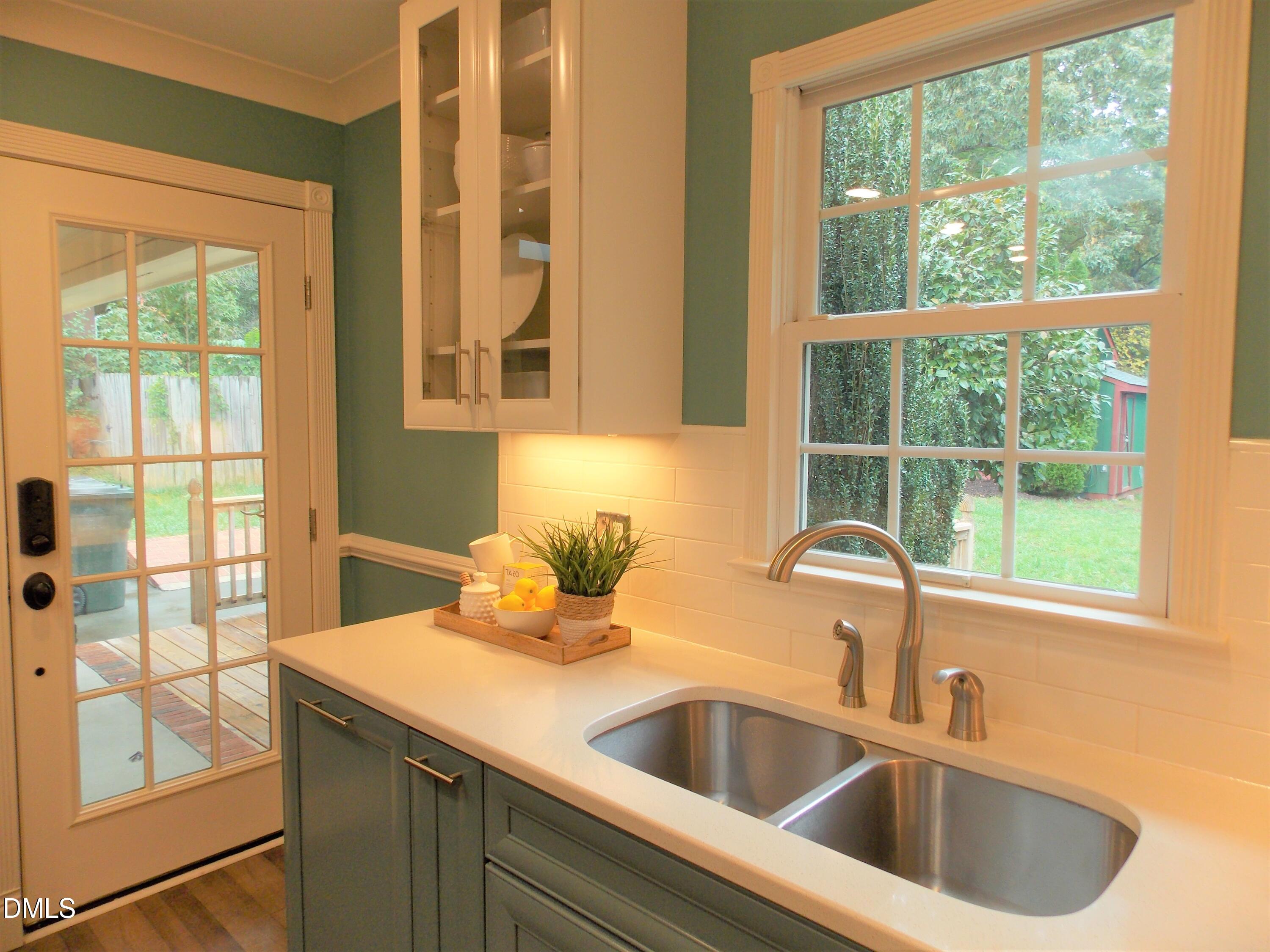 4108 Pleasant Grove Church Road Raleigh, NC 27613 - Photo 4 of 38 a close view of sink and tap
