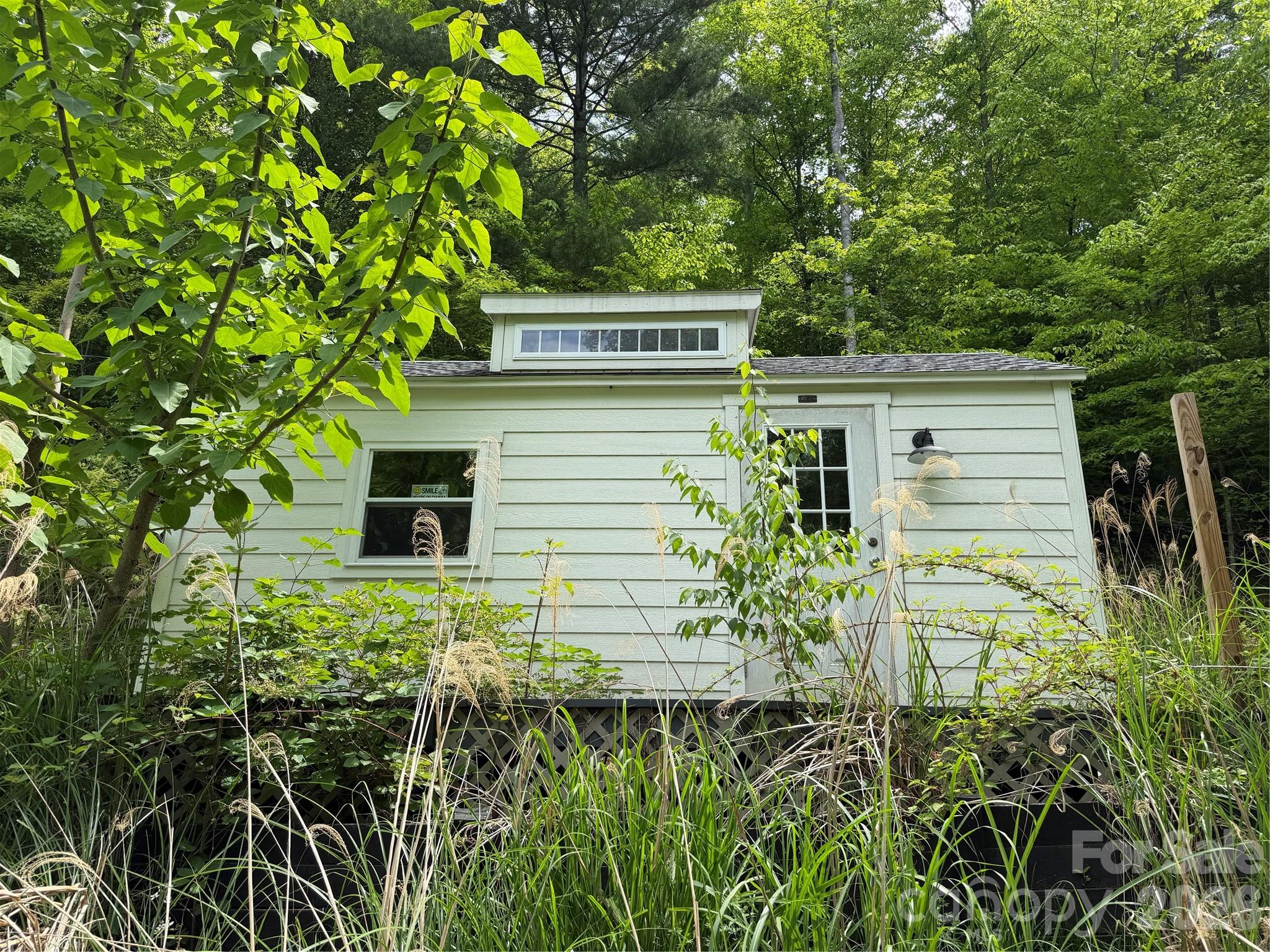 408 Arvil Gosnell Road Marshall, NC 28753 - Photo 4 of 31 a view of a backyard of the house