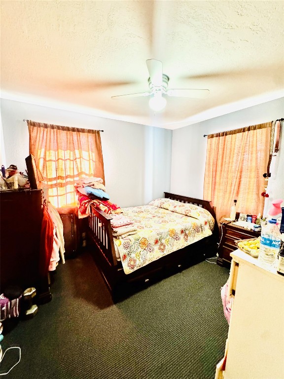 9105 Exeter Street Houston, TX 77093 - Photo 13 of 21 a bedroom with a bed and a window