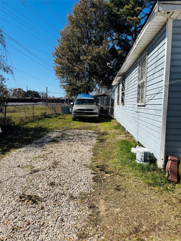 9105 Exeter Street Houston, TX 77093 - Photo 21 of 21 a view of a house with backyard and trees