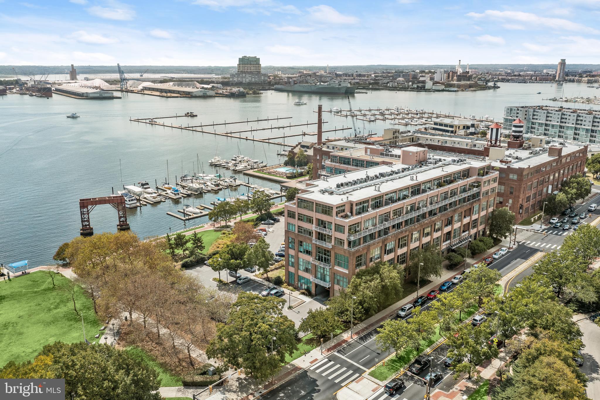 2901 Boston Street, Unit 302 Baltimore, MD 21224 - Photo 1 of 61 a picture of city view with lake view and boat