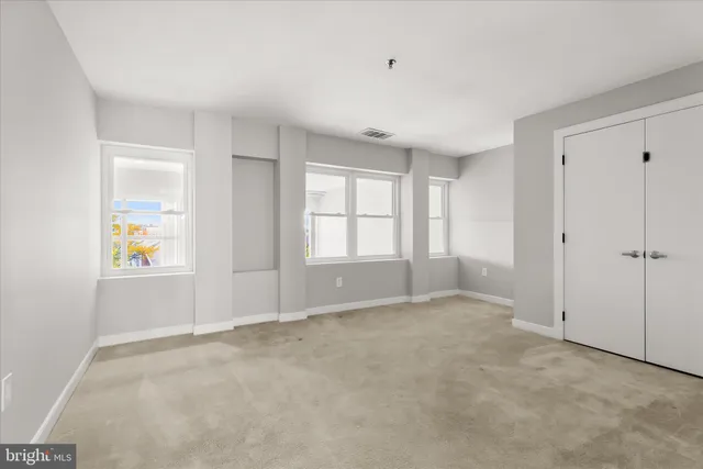 a view of a city with tall buildings