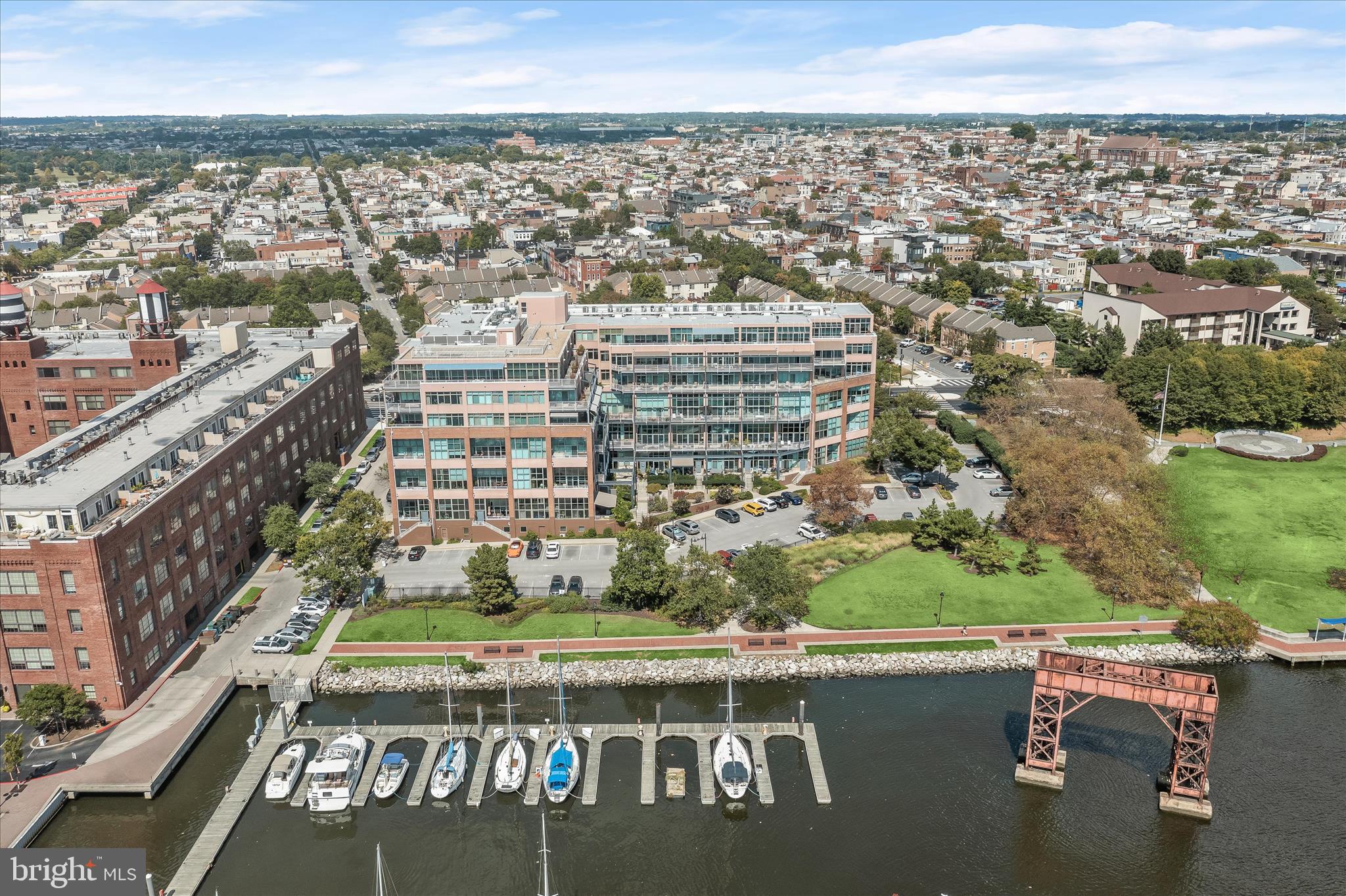 2901 Boston Street, Unit 302 Baltimore, MD 21224 - Photo 36 of 61 a view of a city with tall buildings