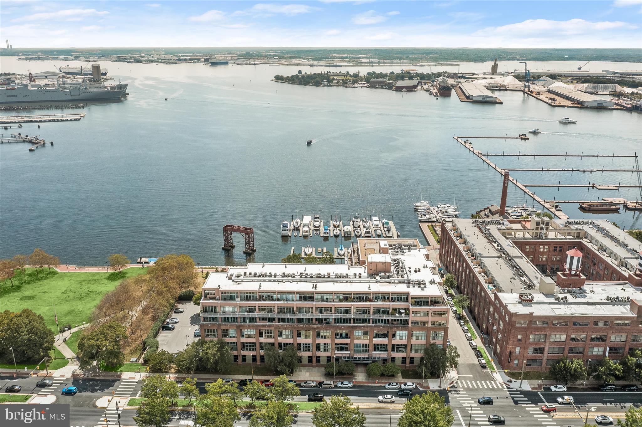 2901 Boston Street, Unit 302 Baltimore, MD 21224 - Photo 38 of 61 a view of a lake with building in front of it