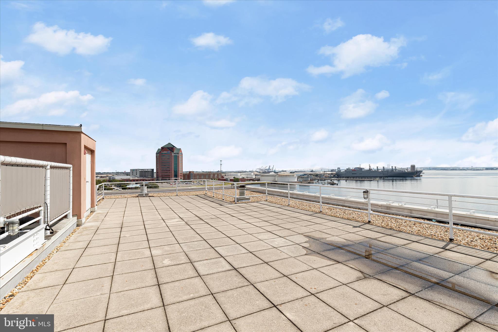 2901 Boston Street, Unit 302 Baltimore, MD 21224 - Photo 49 of 61 a view of a terrace with seating space