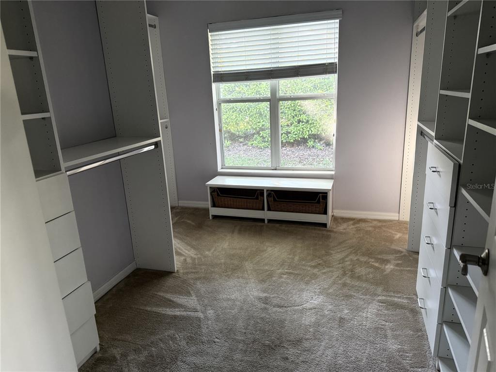 26601 Bull Run Leesburg, FL 34748 - Photo 13 of 15 a view of room with window and refrigerator