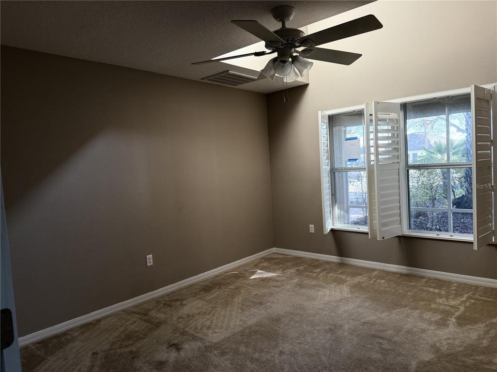 26601 Bull Run Leesburg, FL 34748 - Photo 6 of 15 a view of an empty room with a window