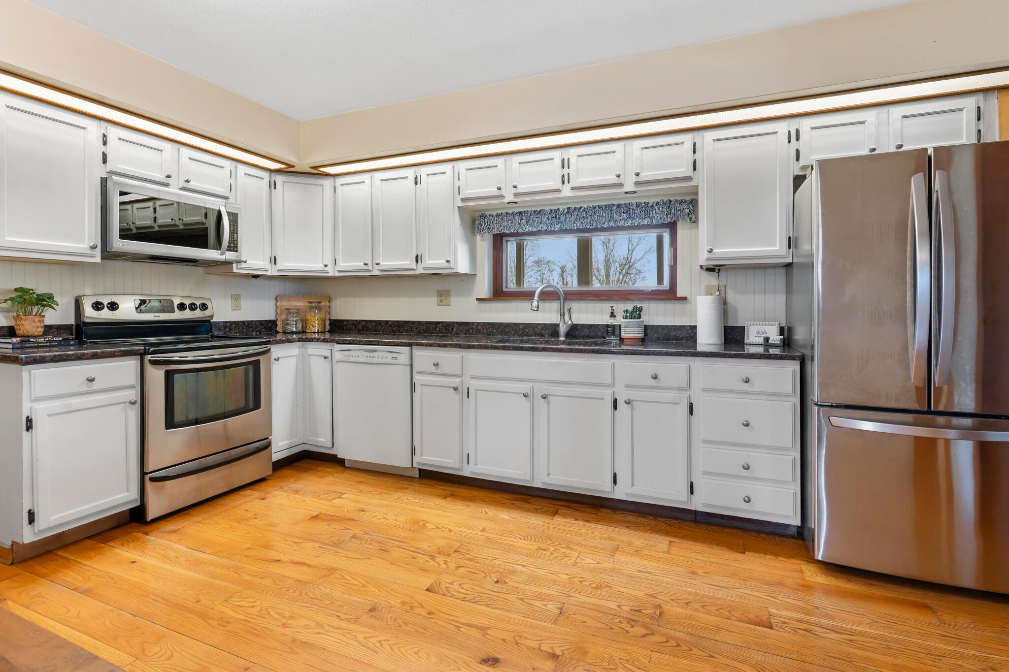 13535 Vans Valley Road Galena, OH 43021 - Photo 11 of 87 Kitchen with view to the back patio