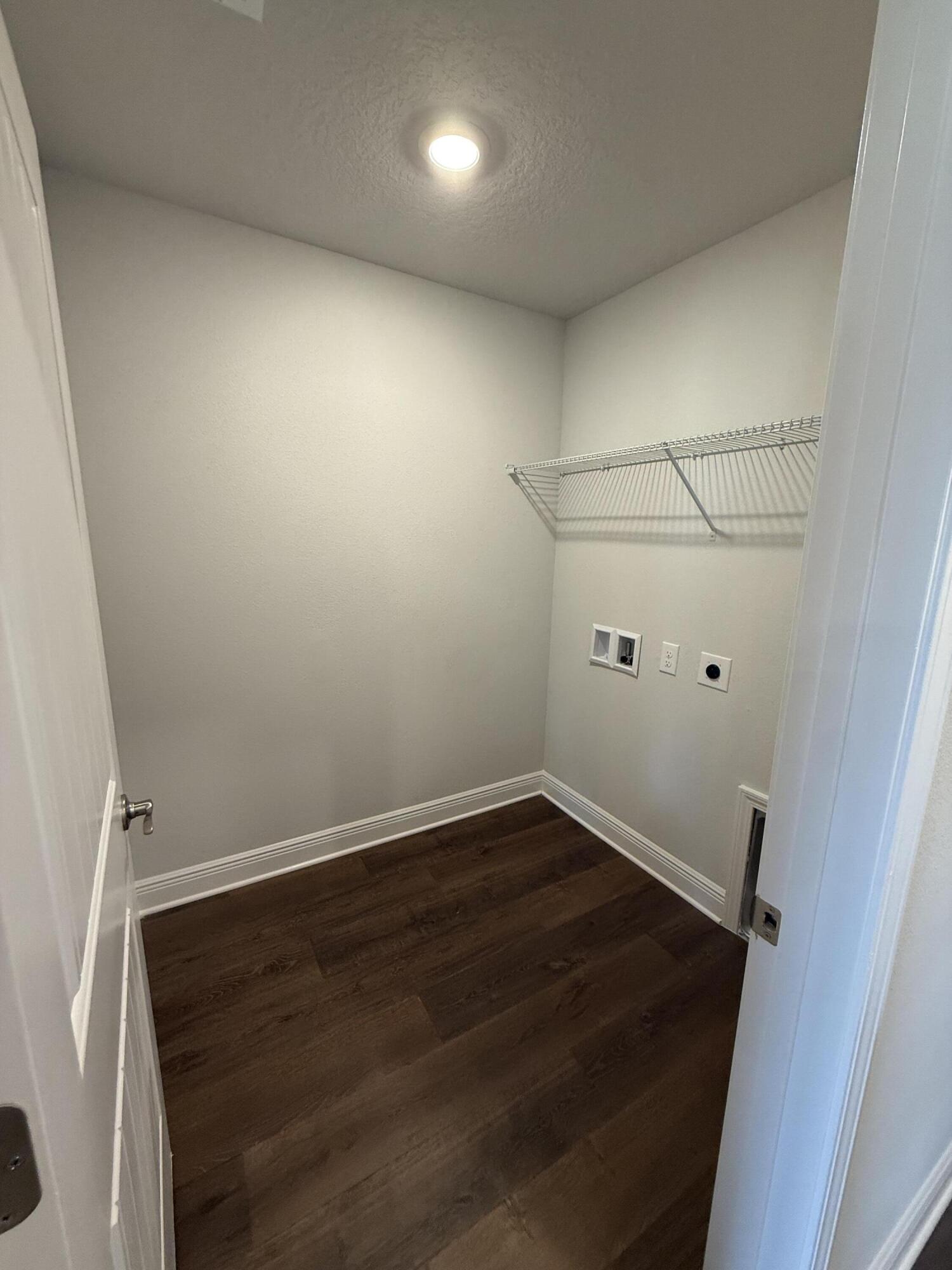 6004 Crocket Cove Crestview, FL 32539 - Photo 16 of 24 an empty room with wooden floor and window