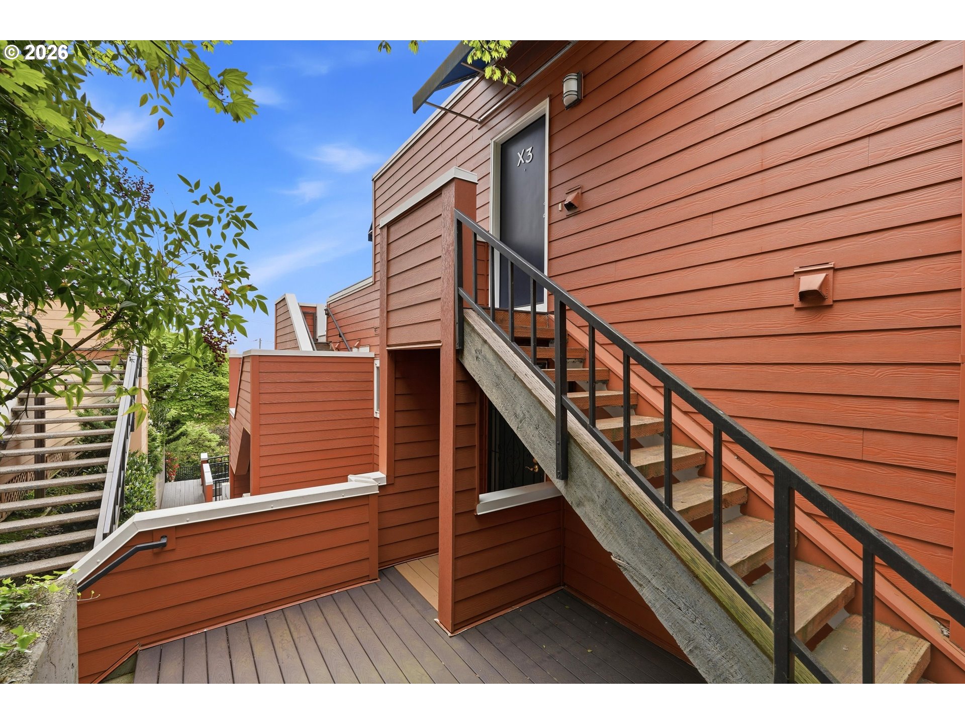 3515 Southwest Barbur Boulevard, Unit X3 Portland, OR 97239 - Photo 25 of 33 a view of outdoor space with deck and wooden floor