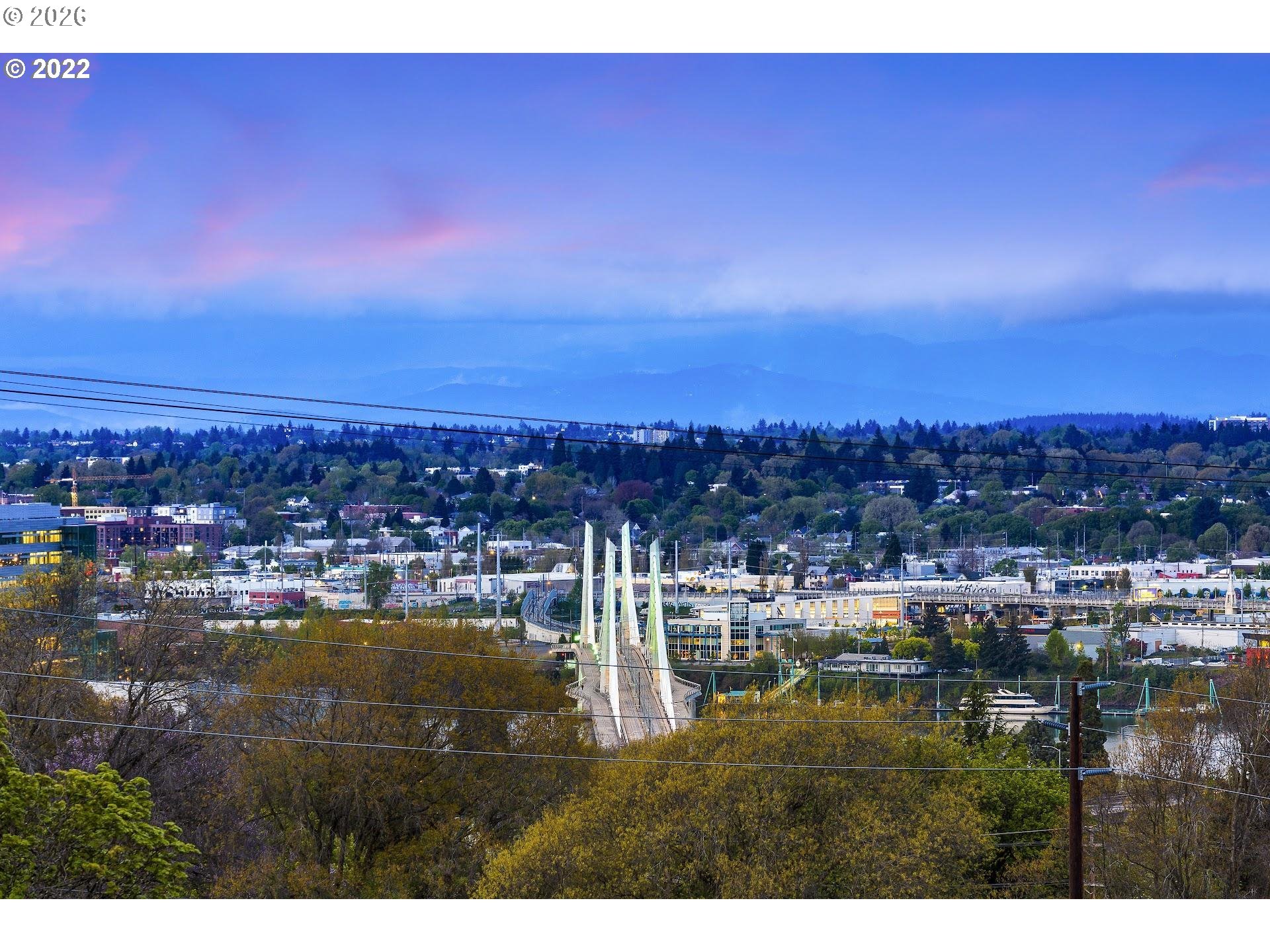 3515 Southwest Barbur Boulevard, Unit X3 Portland, OR 97239 - Photo 28 of 33 a view of a lake and city