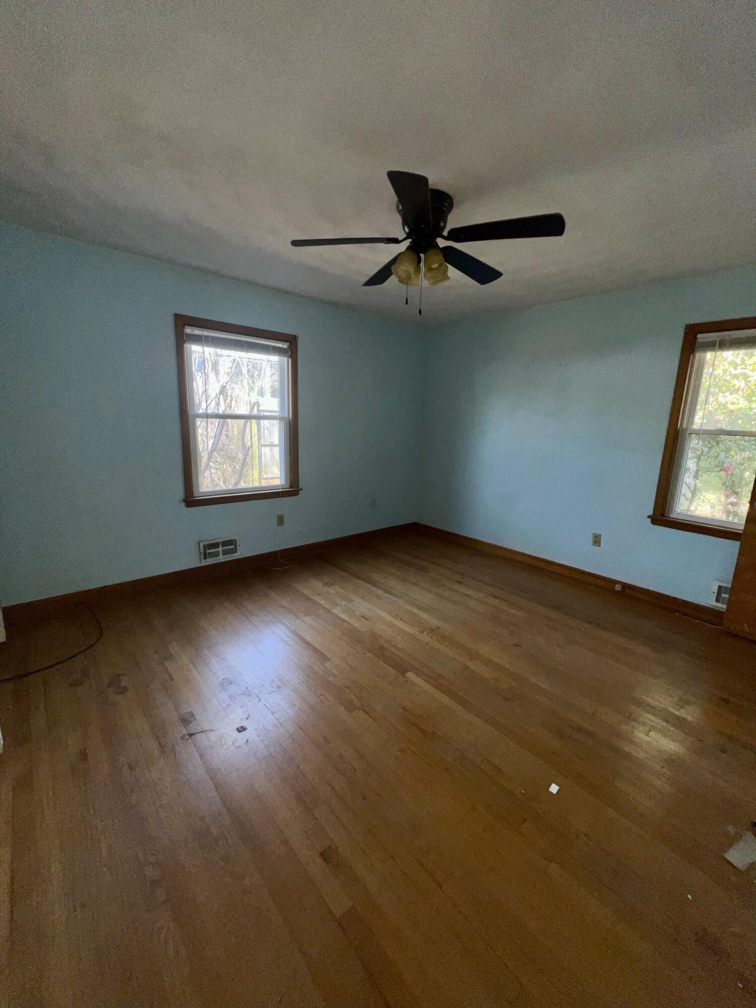 984 Colbourne Avenue Vinton, VA 24179 - Photo 16 of 22 a view of empty room with wooden floor and fan