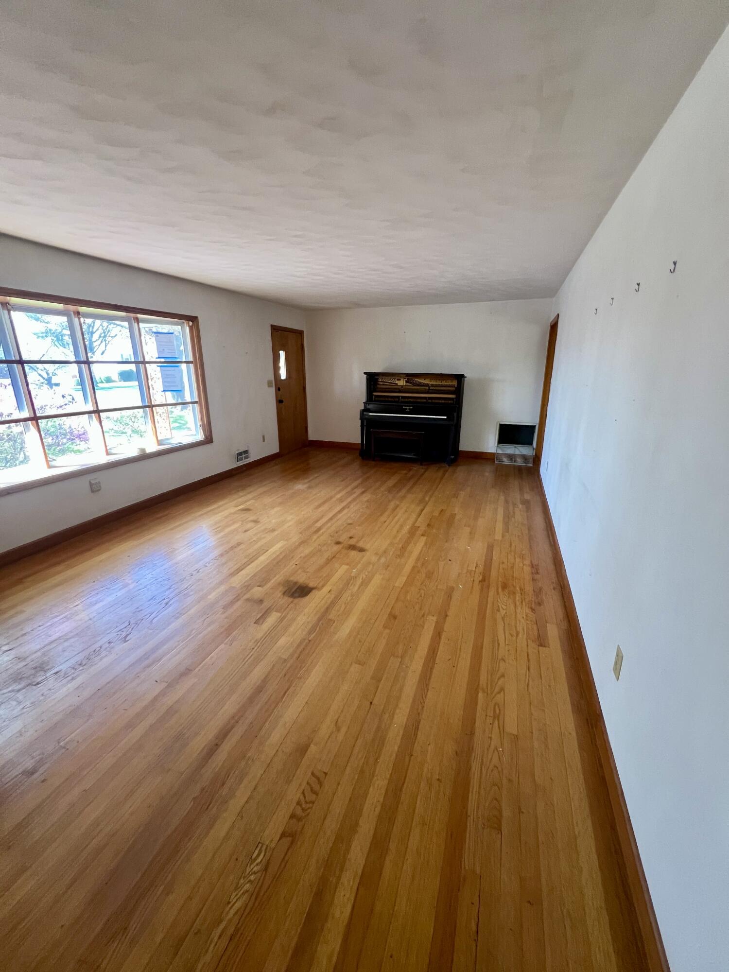 984 Colbourne Avenue Vinton, VA 24179 - Photo 8 of 22 wooden floor in a hall with an entryway