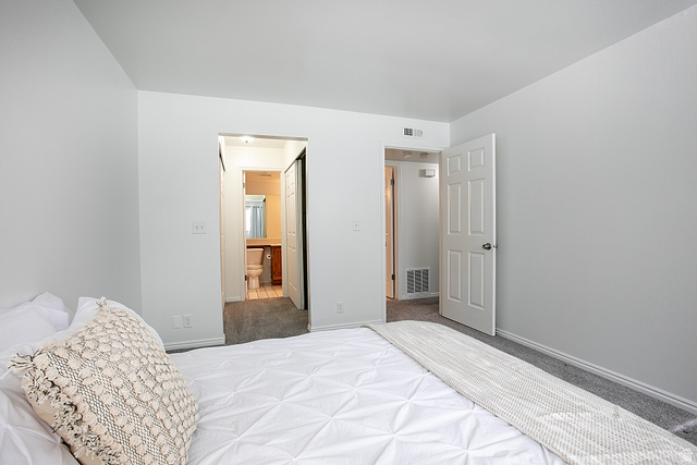 650 South Main Street, Unit 6103 Bountiful, UT 84010 - Photo 12 of 25 Primary bedroom with closet and separate access to bathroom