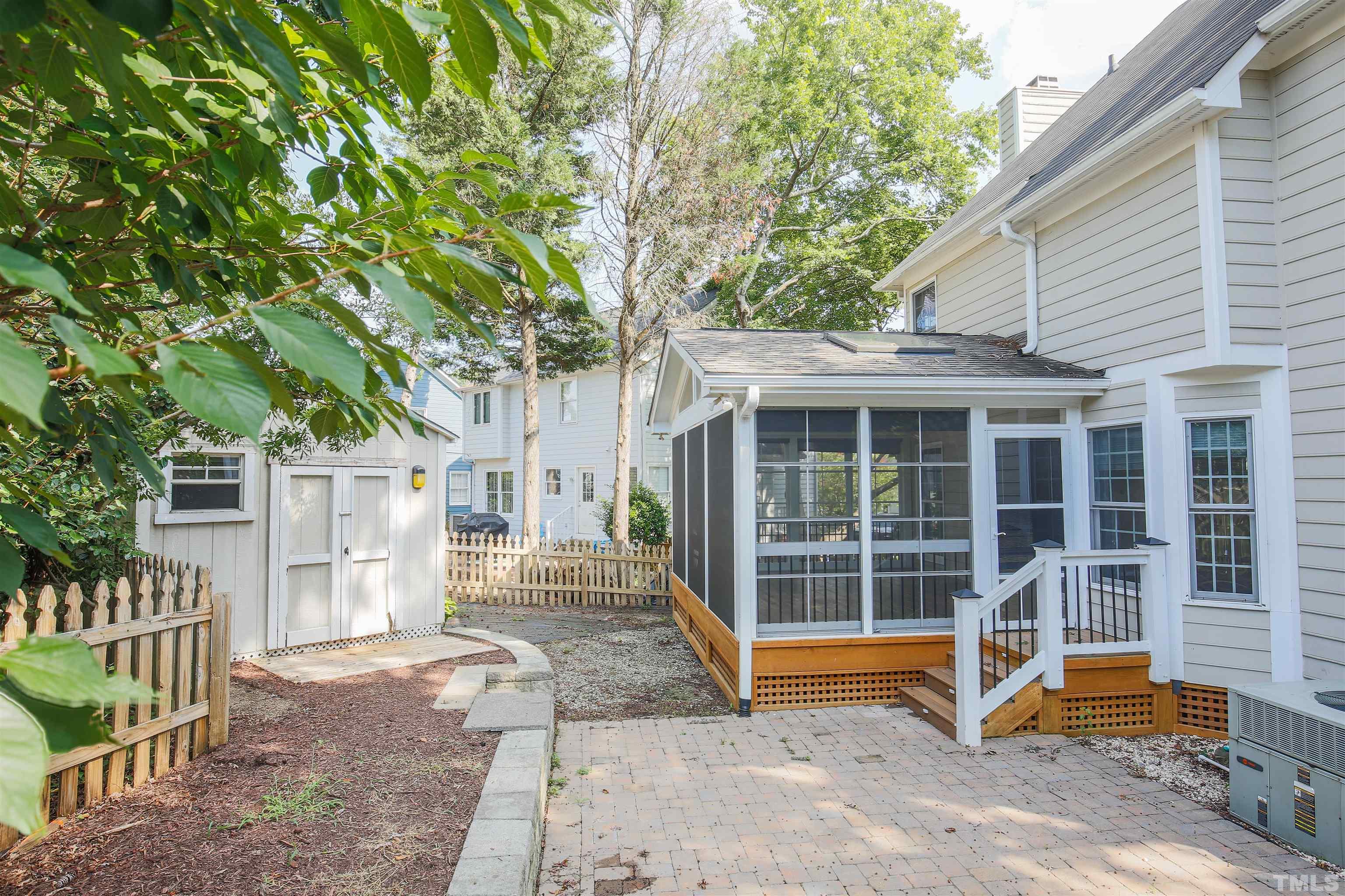 2305 Florida Court Raleigh, NC 27615 - Photo 24 of 24 a view of a house with backyard porch and furniture