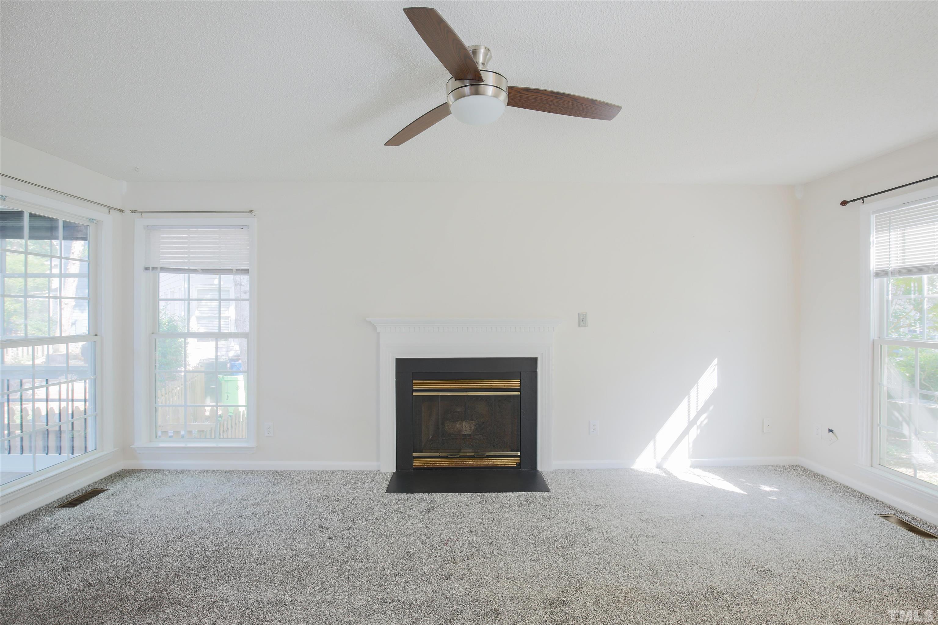 2305 Florida Court Raleigh, NC 27615 - Photo 4 of 24 an empty room with windows
