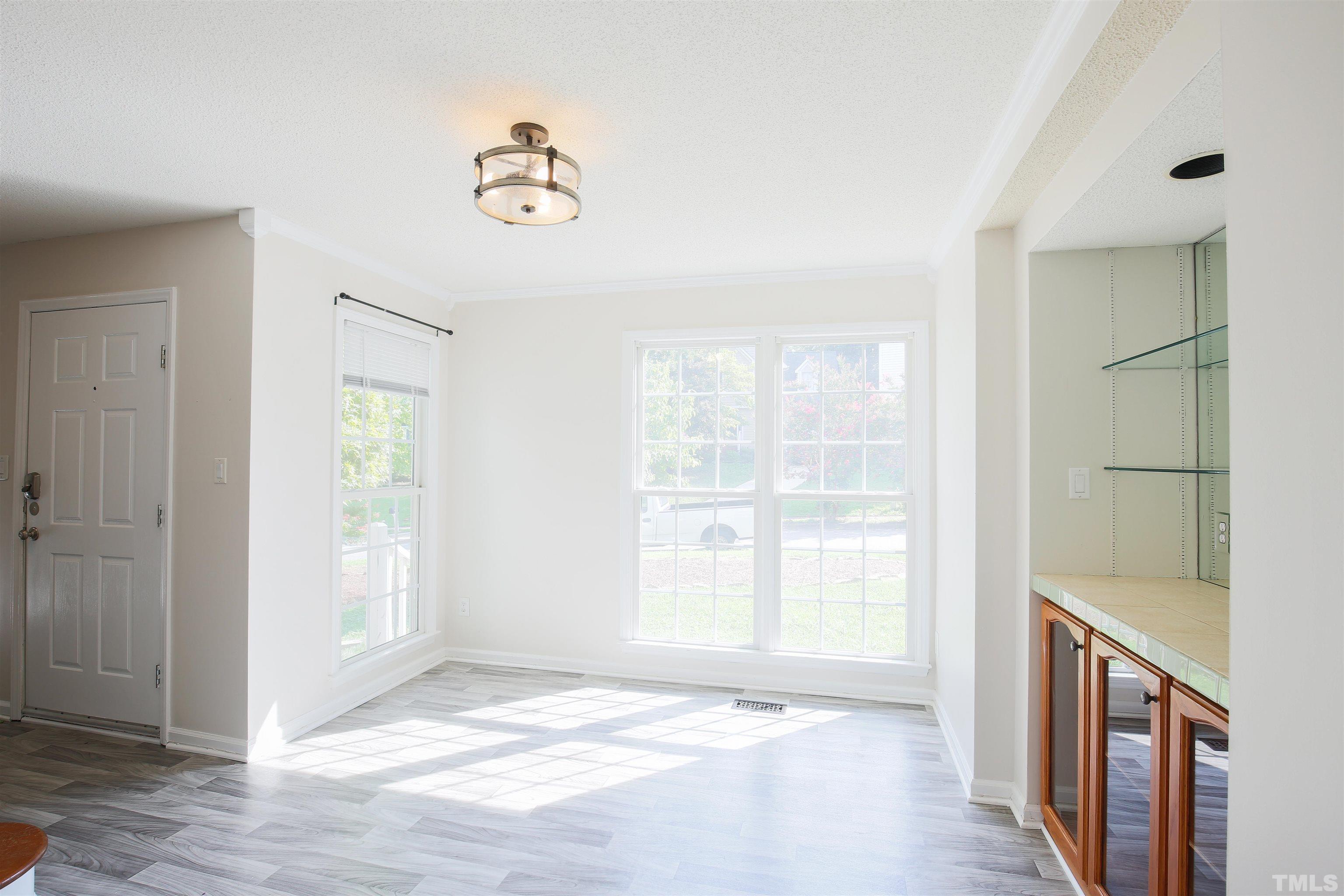 2305 Florida Court Raleigh, NC 27615 - Photo 7 of 24 a view of an empty room and window
