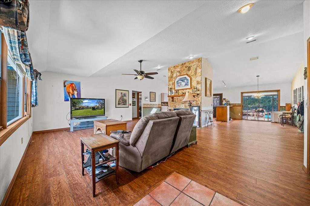 750 Southwest 91st Place Ocala, FL 34476 - Photo 14 of 51 a living room with furniture and a wooden floor