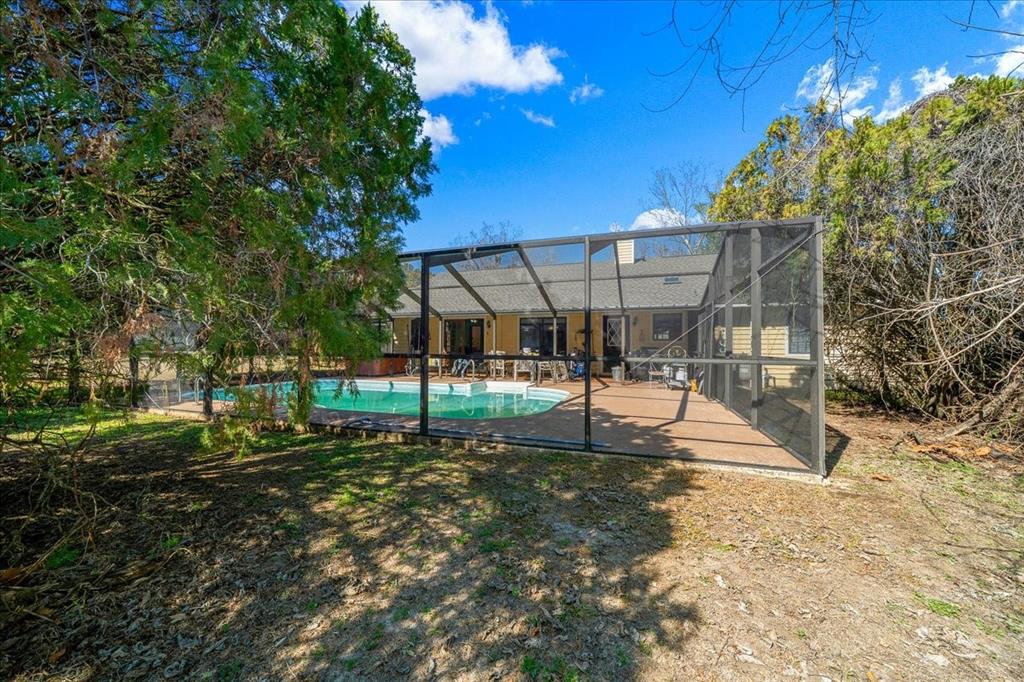 750 Southwest 91st Place Ocala, FL 34476 - Photo 31 of 51 a view of a yard with a house