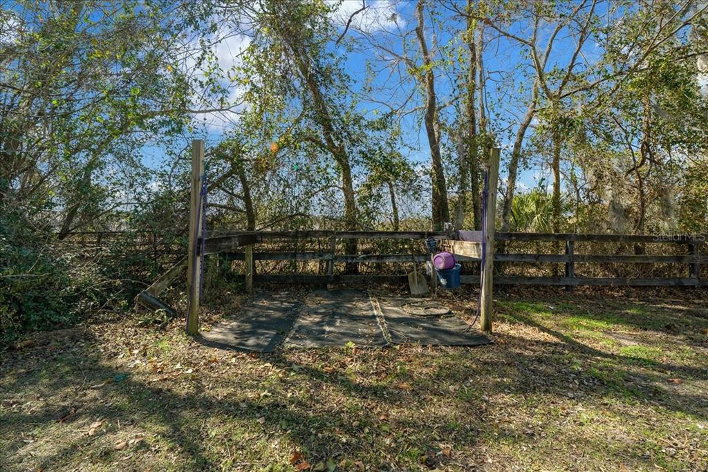 750 Southwest 91st Place Ocala, FL 34476 - Photo 38 of 51 a view of backyard with wooden fence