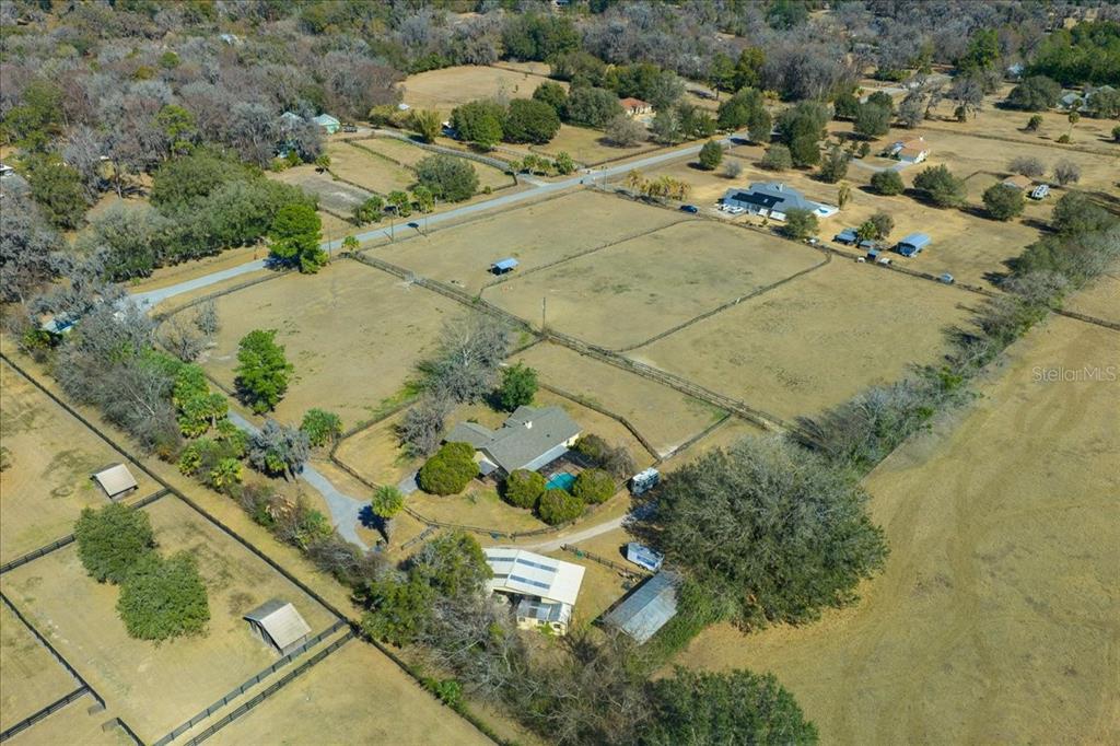 750 Southwest 91st Place Ocala, FL 34476 - Photo 44 of 51 an aerial view of residential houses with outdoor space