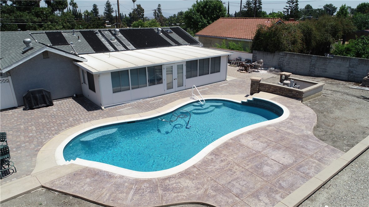 7262 Beryl Street Rancho Cucamonga, CA 91701 - Photo 11 of 30 a view of a swimming pool with a patio