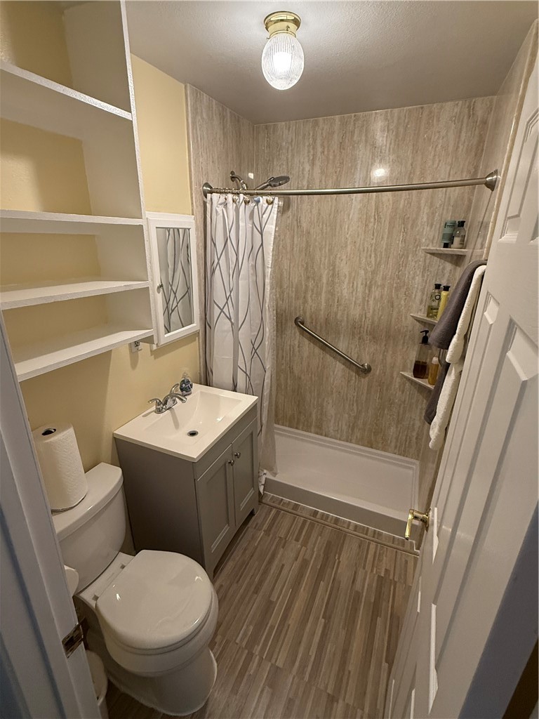 7262 Beryl Street Rancho Cucamonga, CA 91701 - Photo 15 of 30 a bathroom with a sink toilet and shower