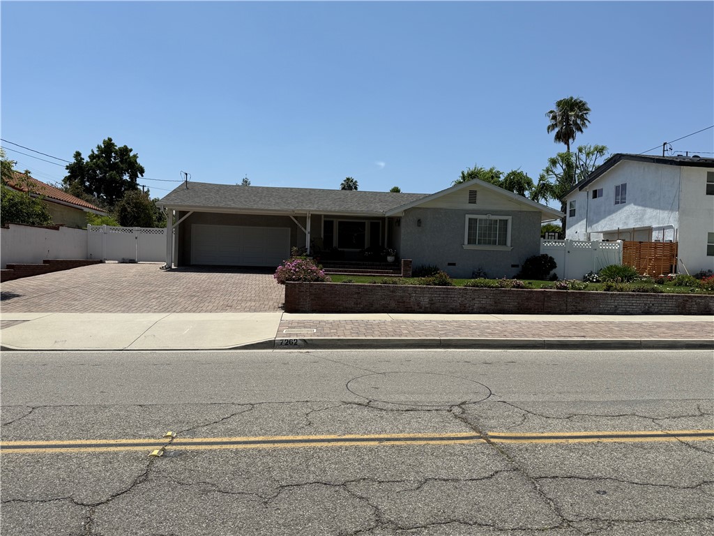 7262 Beryl Street Rancho Cucamonga, CA 91701 - Photo 5 of 30 a front view of a house with a porch