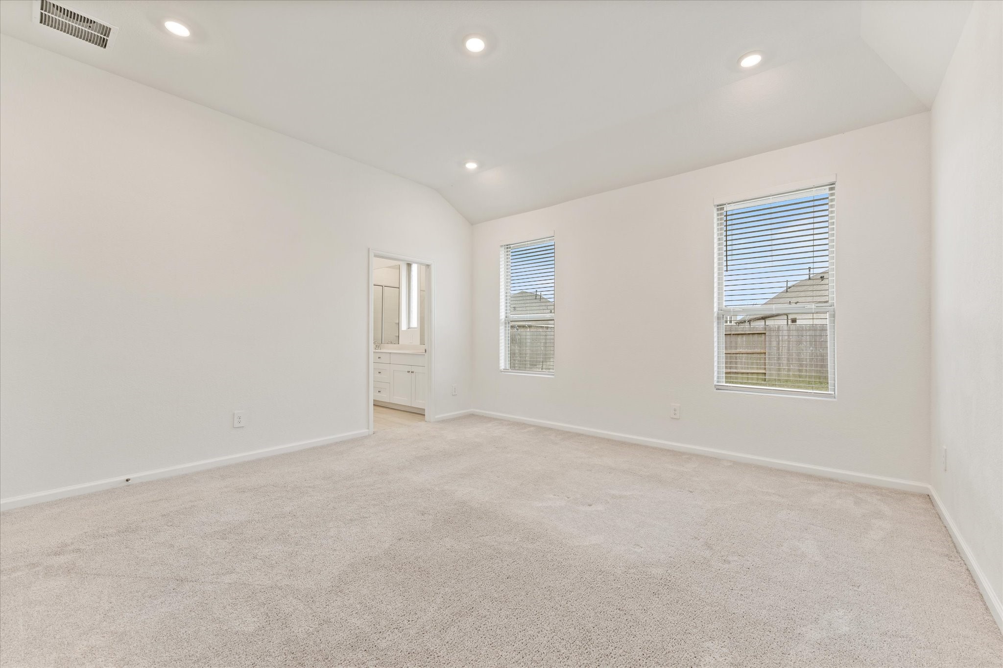 15520 Sunset Maple Court Conroe, TX 77302 - Photo 14 of 46 an empty room with windows and closet
