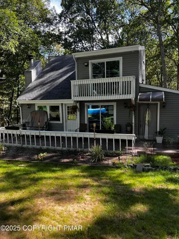 a front view of house with yard