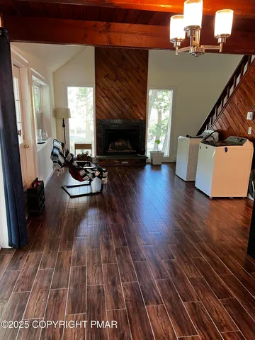 a kitchen with stainless steel appliances granite countertop a refrigerator and a stove