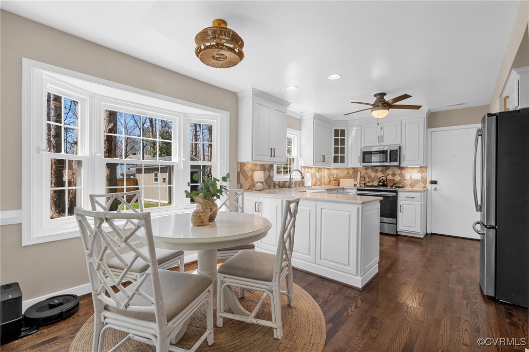 706 Watch Hill Road Midlothian, VA 23114 - Photo 8 of 42 a kitchen with a table and chairs in it