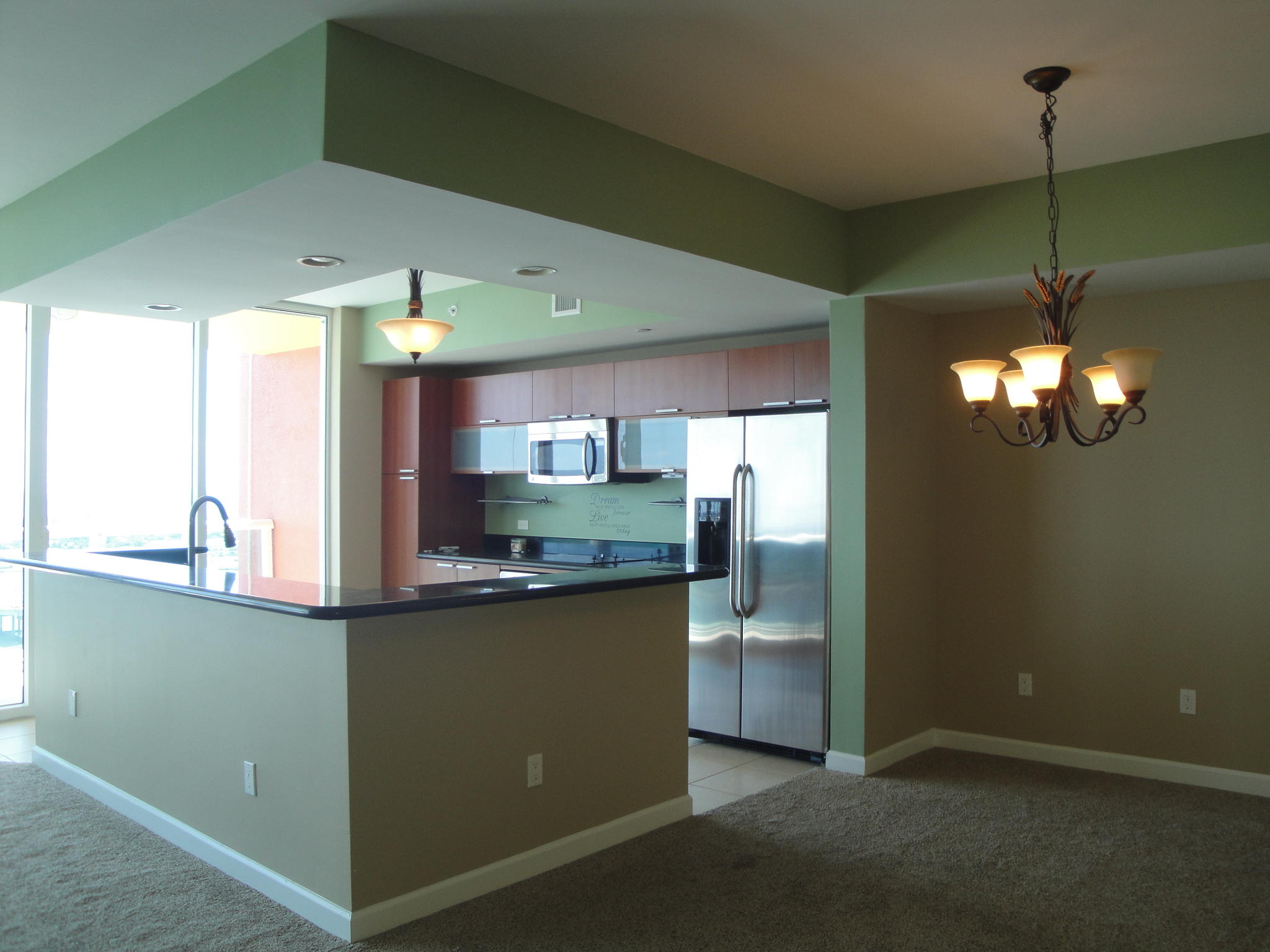 2640 Lake Shore Drive, Unit 2307 Riviera Beach, FL 33404 - Photo 29 of 77 KITCHEN+DINING ROOM (9)