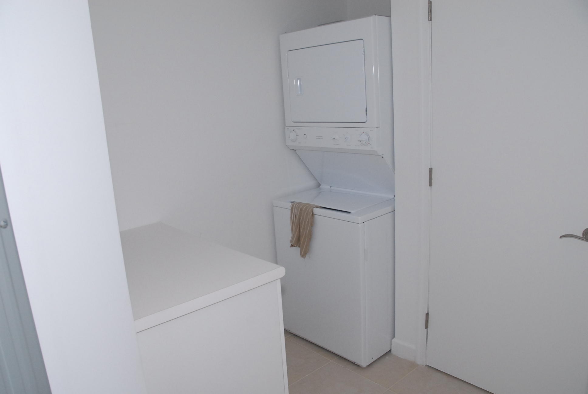 2640 Lake Shore Drive, Unit 2307 Riviera Beach, FL 33404 - Photo 74 of 77 SPACIOUS LAUNDRY RM WITH STORAGE CLOSET