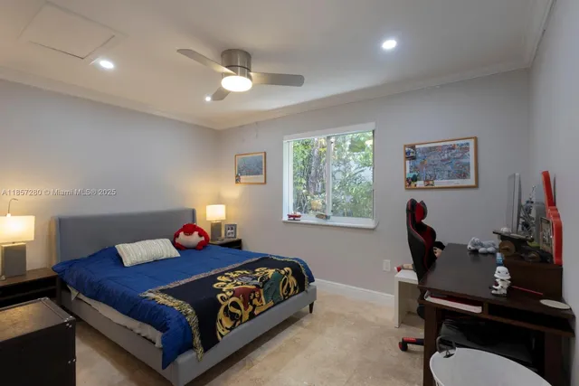 a bed room with a bed and a window