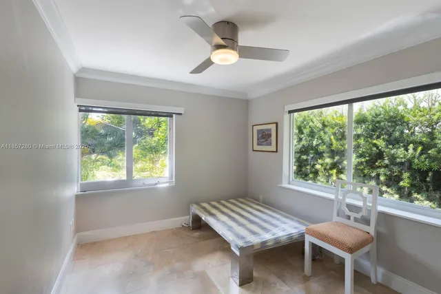 a room with furniture and a window